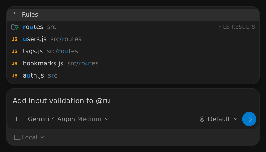 The @ menu above the Antigravity App message box after typing @ru, listing the Rules category followed by the routes folder and the users.js, tags.js, bookmarks.js, and auth.js files, each with its folder path