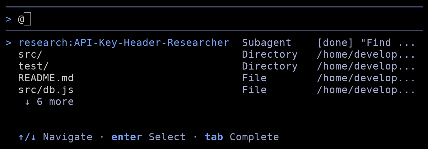 The Antigravity CLI prompt box with @ typed, showing a suggestions list: a research subagent marked done, followed by the src and test directories and the README.md and src/db.js files, each with the start of its full path